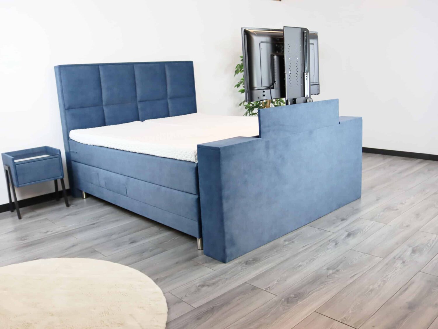Tv lift boxspring bed